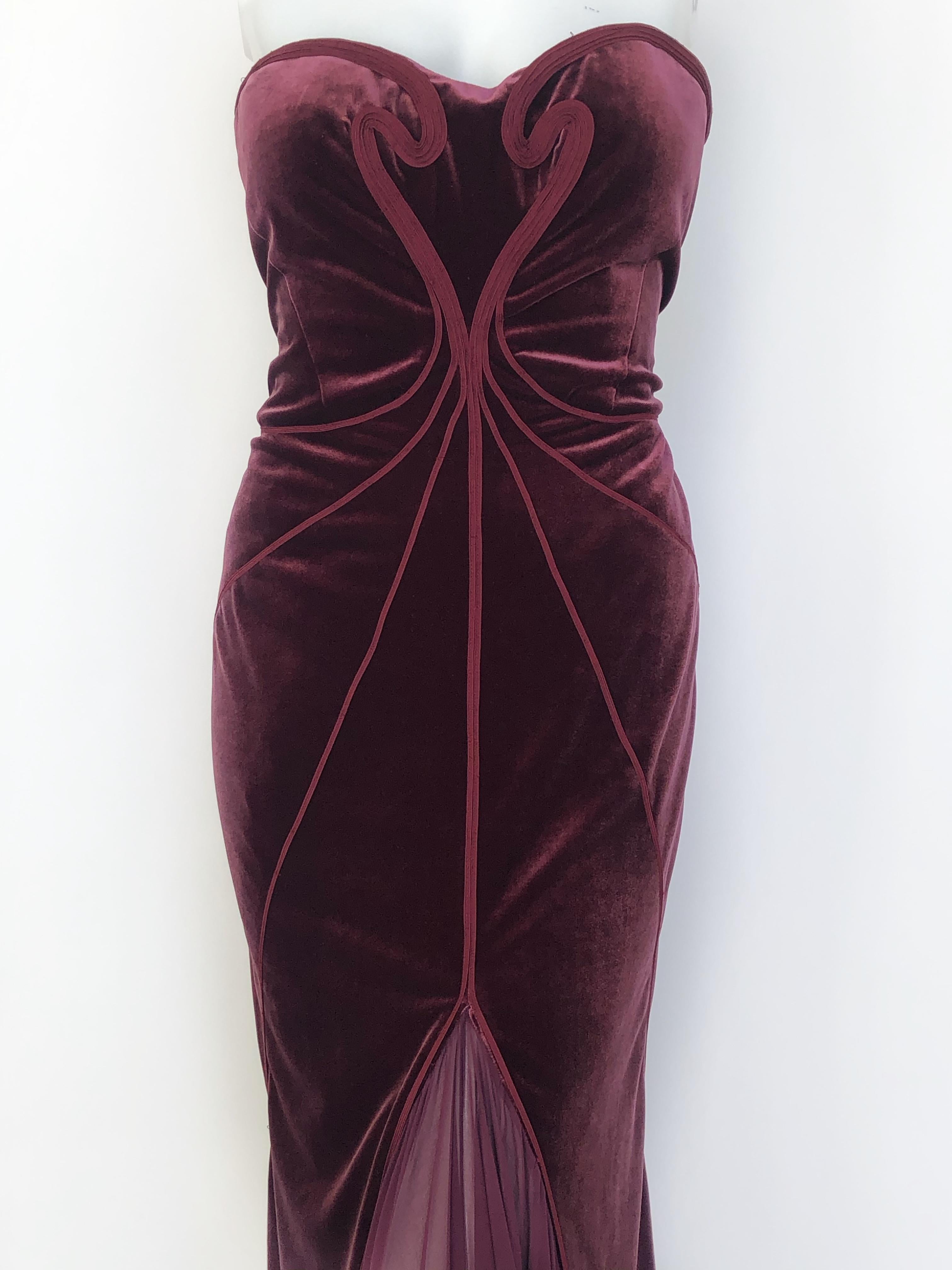 Strapless velvet with beautiful detailing across the bodice, and a sheer gored skirt makes this Zac Posen gown so elegant 