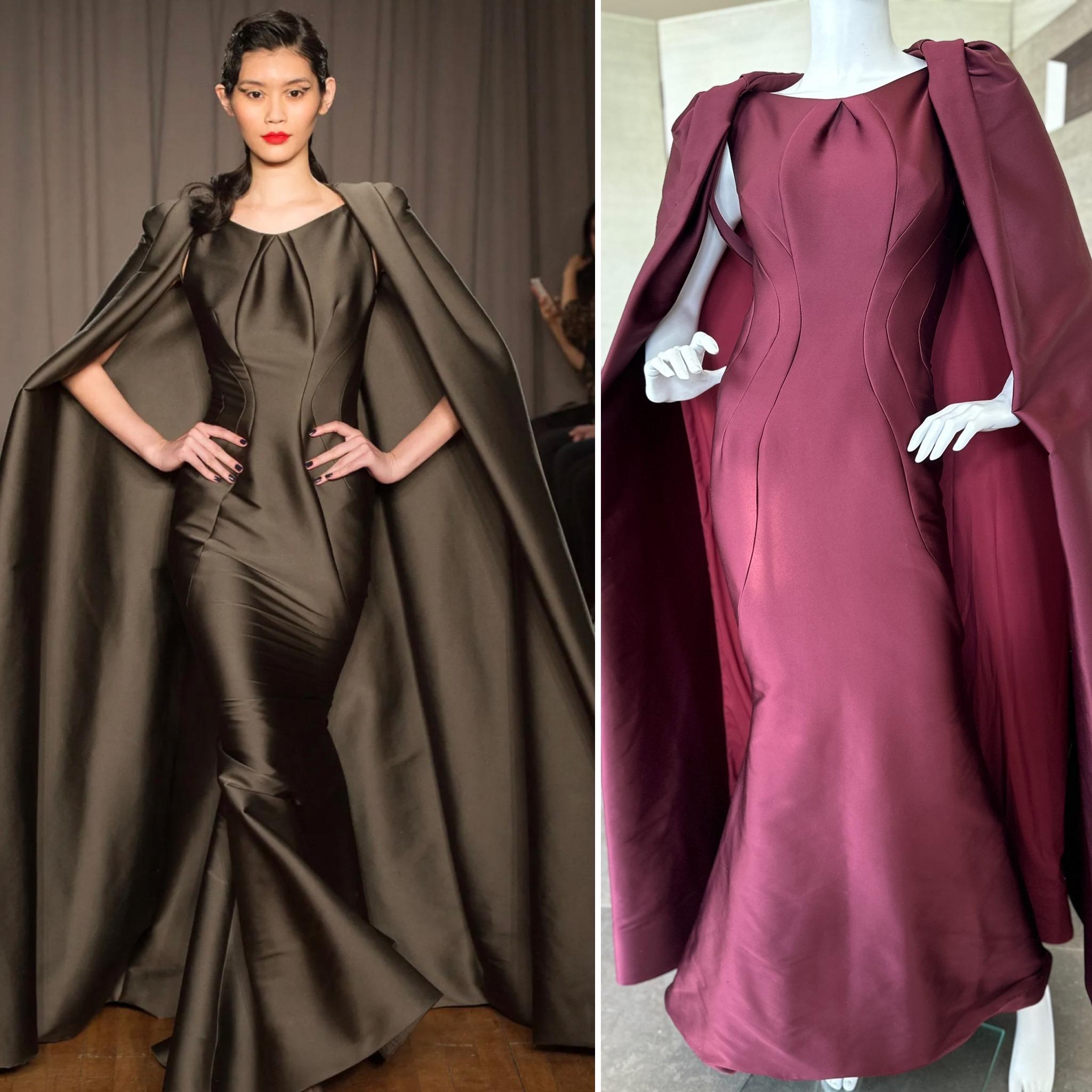 
Zac Posen Dramatic Vintage Fishtail Mermaid Evening Dress with Matching Cape .
Shown on the runway in brown, this burgundy version is even more resplendent,
From Fall 2014, which was presented just as the Met Museum was opening it's Costume