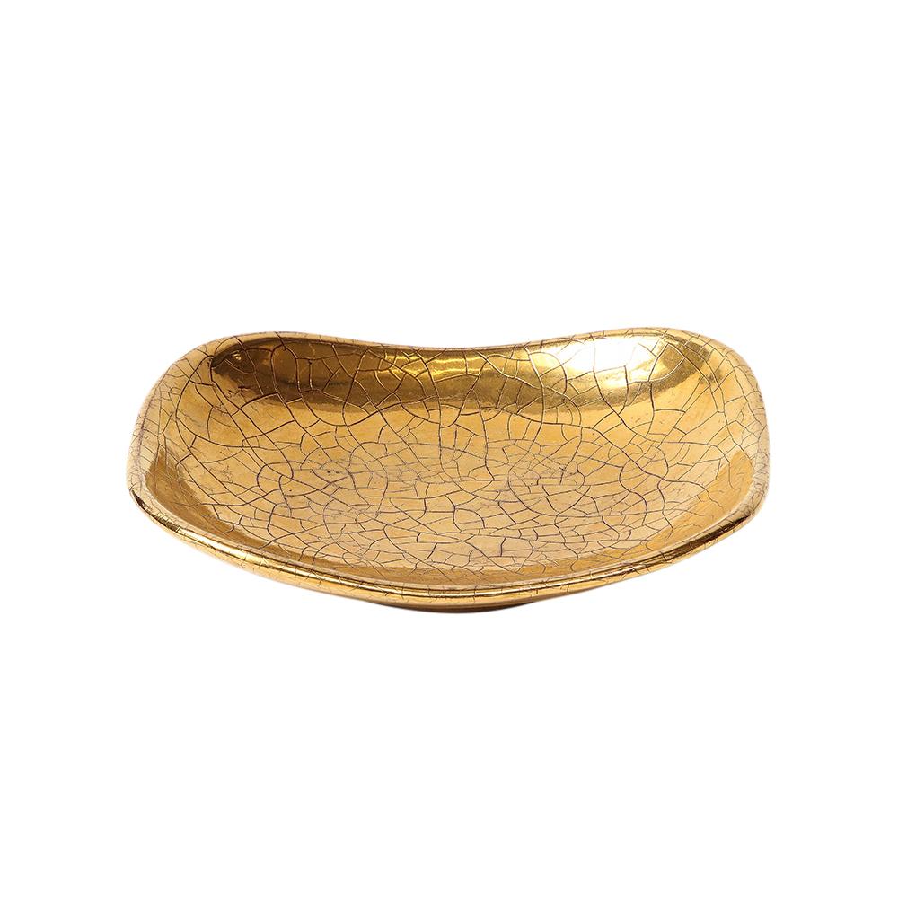 Zaccagnini Tray, Ceramic, Gold Crackle Glaze, Signed. Small scale footed tray with organic scoop form and glazed in gold over a dark blood red underglaze. Signed on the underside with impressed mark: UZ Made in Italy and glazed factory mark: B116.