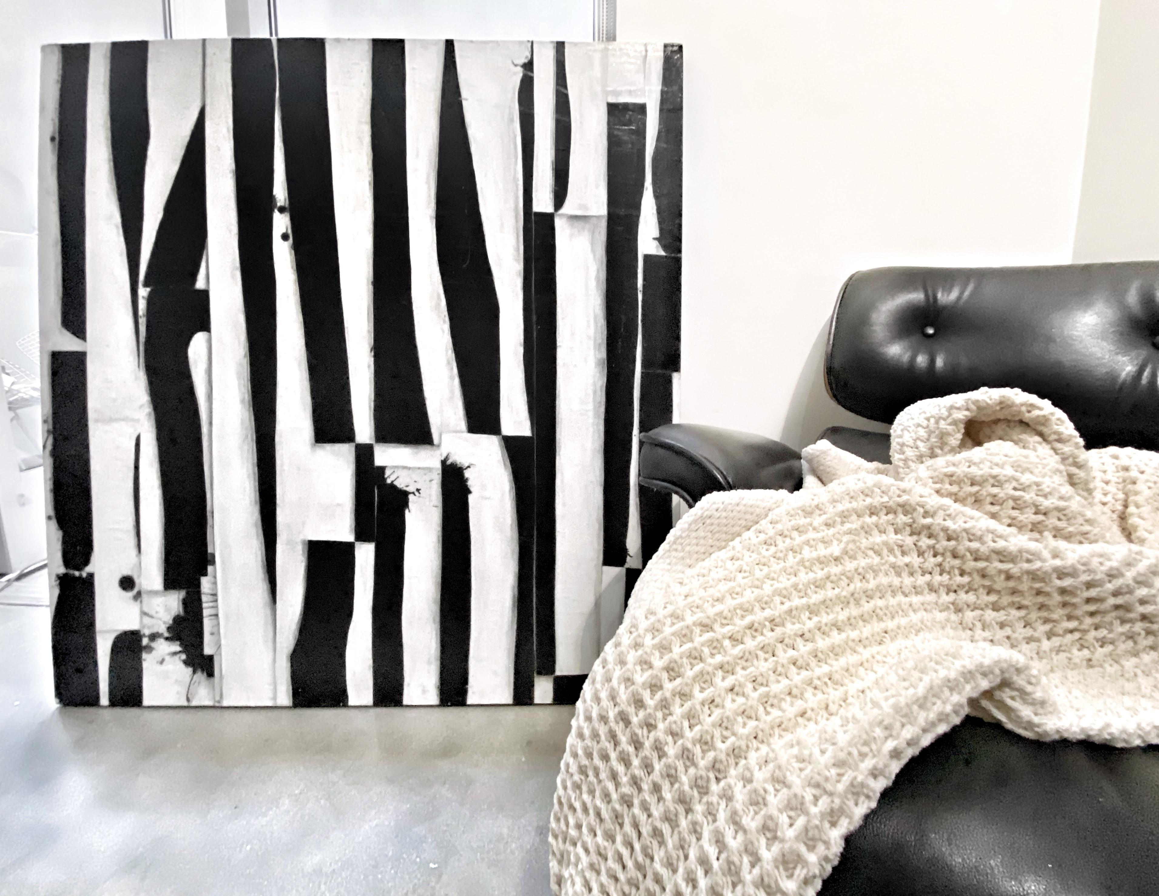 This is a black and white abstract diptych on a wood panel.

This series is very minimalistic and interior. 
Most of the time, I use just two colors and work with geometric and abstract shapes. It doesn't appear as deep as the 'Chaos and Control