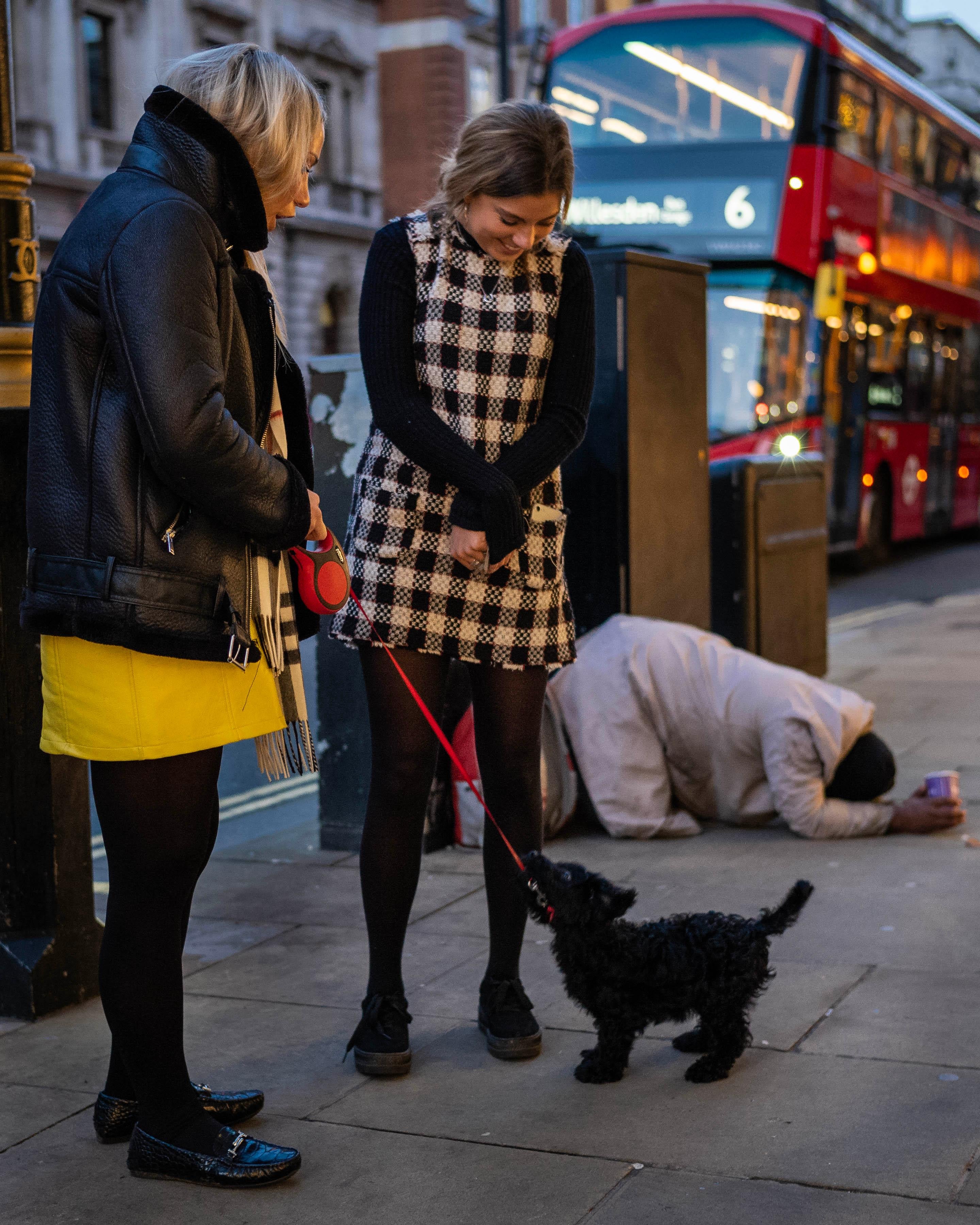 Pedestrian Dissonance
London, 2018

The disparity in quality of life captured by Whitford in this image is captivating. To look at this image is to get the sense that this moment could happen anywhere at any time. This photograph is at the same time