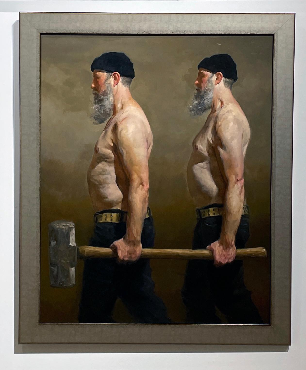 two men with a hammer