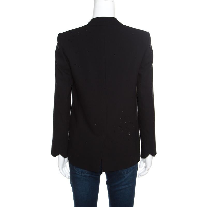 Nothing gives you a better style than a well-tailored blazer. This Valence Bis blazer by Zadig and Voltaire is a classic creation meant to elevate your evening look. Cut from a black-coloured blended fabric, it is adorned with sequin embellishments