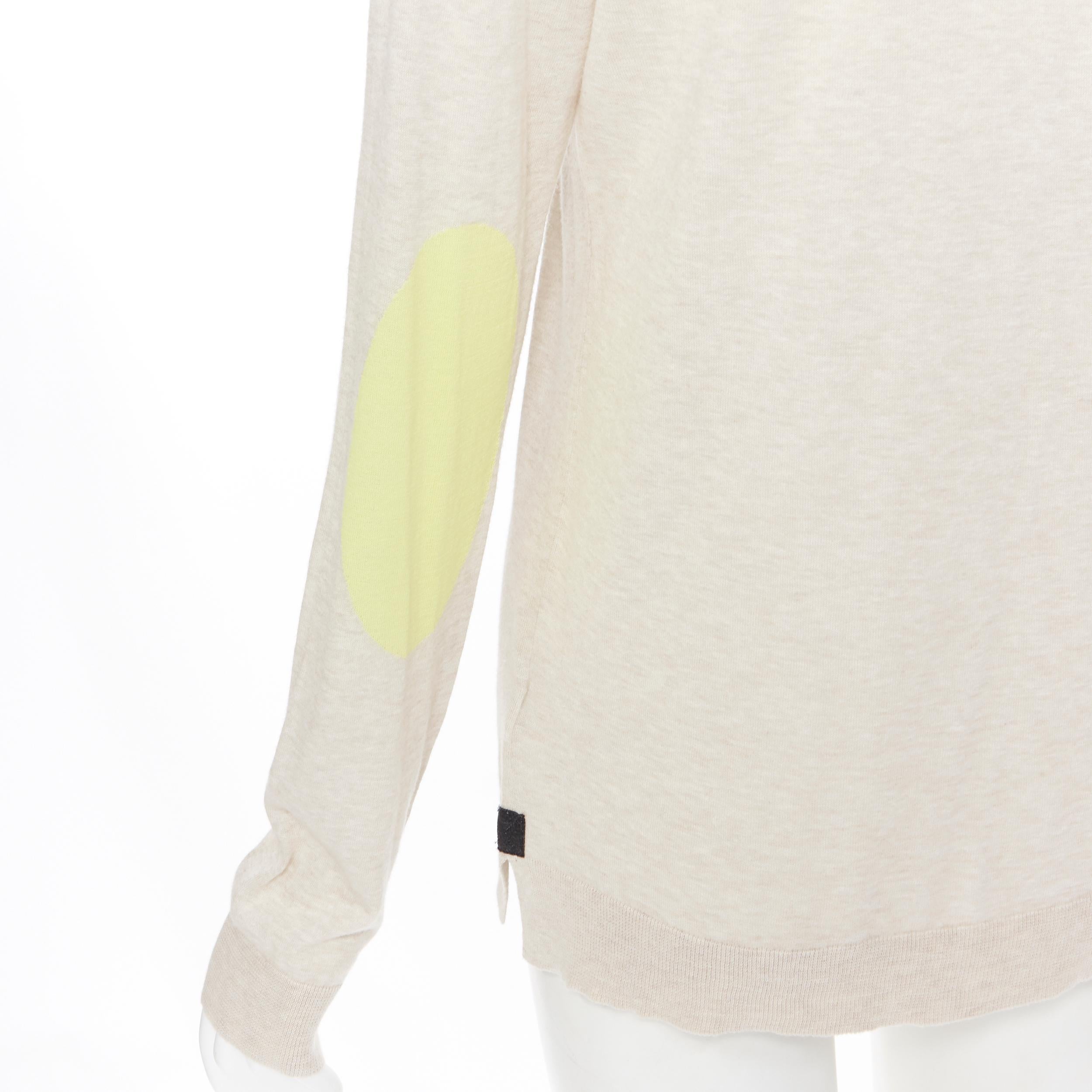 ZADIG VOLTAIRE 100% cotton beige ZV logo yellow elbow V-neck sweater S
Brand: Zadig Voltaire
Model Name / Style: Pullover sweater
Material: Cotton
Color: Beige, yellow
Pattern: Solid
Extra Detail: V-neck. ZV perforated logo at hem. Black leather