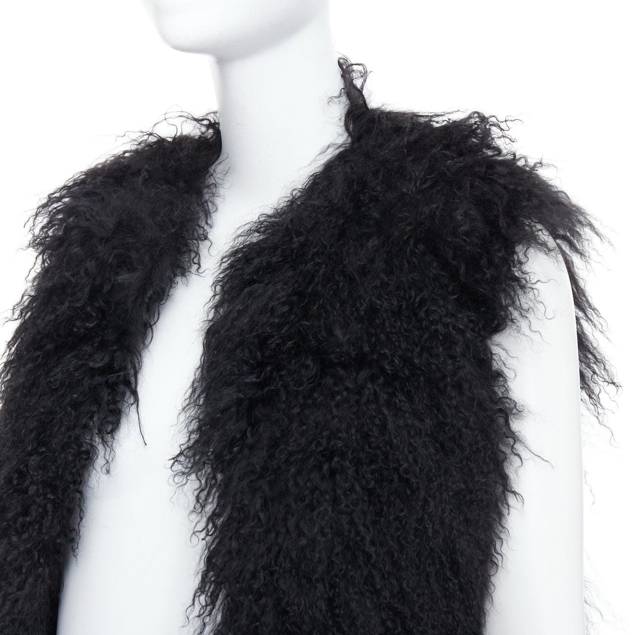 ZADIG & VOLTAIRE black mongolian shearling fur ethnic quilted vest coat
Reference: JACG/A00275
Brand: Zadig & Voltaire
Material: Fur
Color: Black
Pattern: Solid
Lining: Black Fabric

CONDITION:
Condition: Excellent, this item was pre-owned and is in