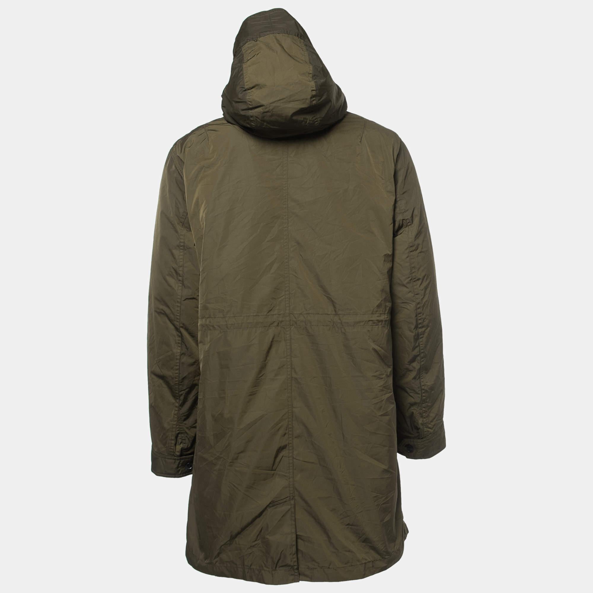 The Zadig & Voltaire Parka jacket is a stylish outerwear piece featuring a rich, dark green color. Made from durable materials, it offers warmth and weather resistance. With a contemporary design and functional elements like pockets and a hood, it's