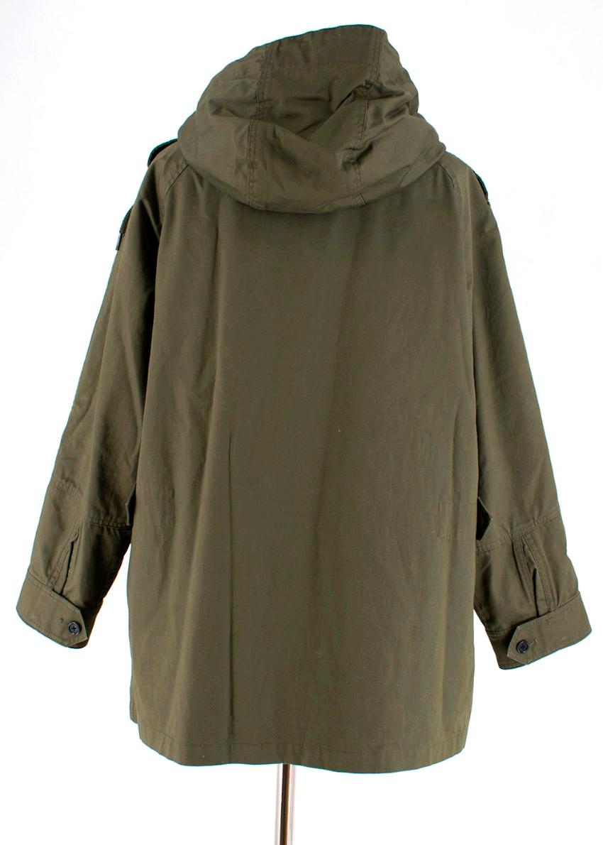 Zadig & Voltaire Deluxe double parka with hood, fully lined with rabbit fur, both sides can be worn together as well separately, 100% cotton. This piece has an oversized XS fit, perfect for fitting a light layer underneath. 

Since birth, Zadig &