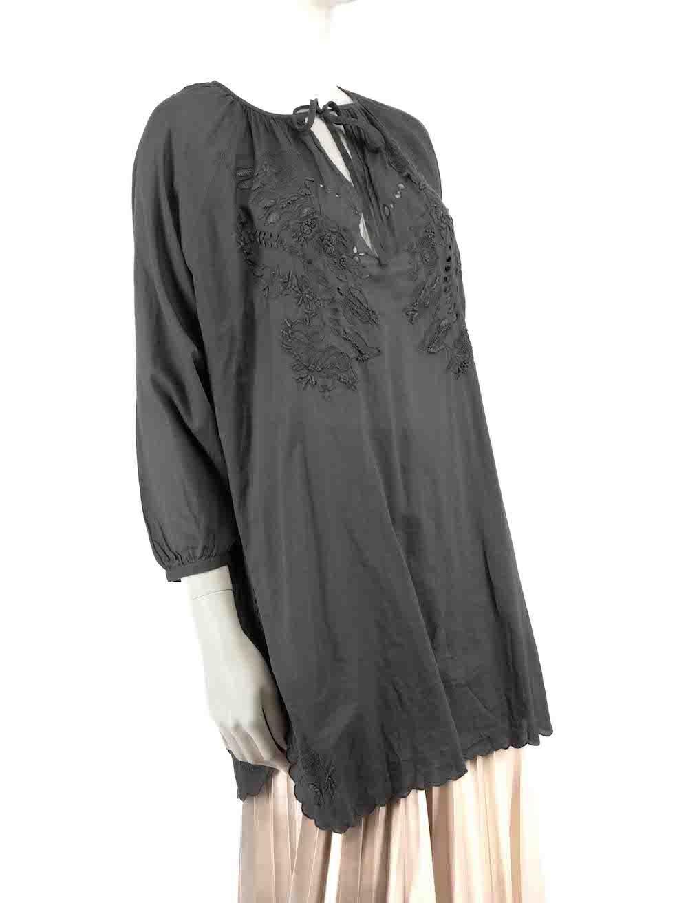 CONDITION is Never worn. No visible wear to top is evident on this new Zadig & Voltaire designer resale item.
 
 Details
 Grey
 Cotton
 Tunic top
 Long sleeves
 Round neck
 Floral lace trim
 Front neck tie
 
 
 Made in India
 
 Composition
 100%