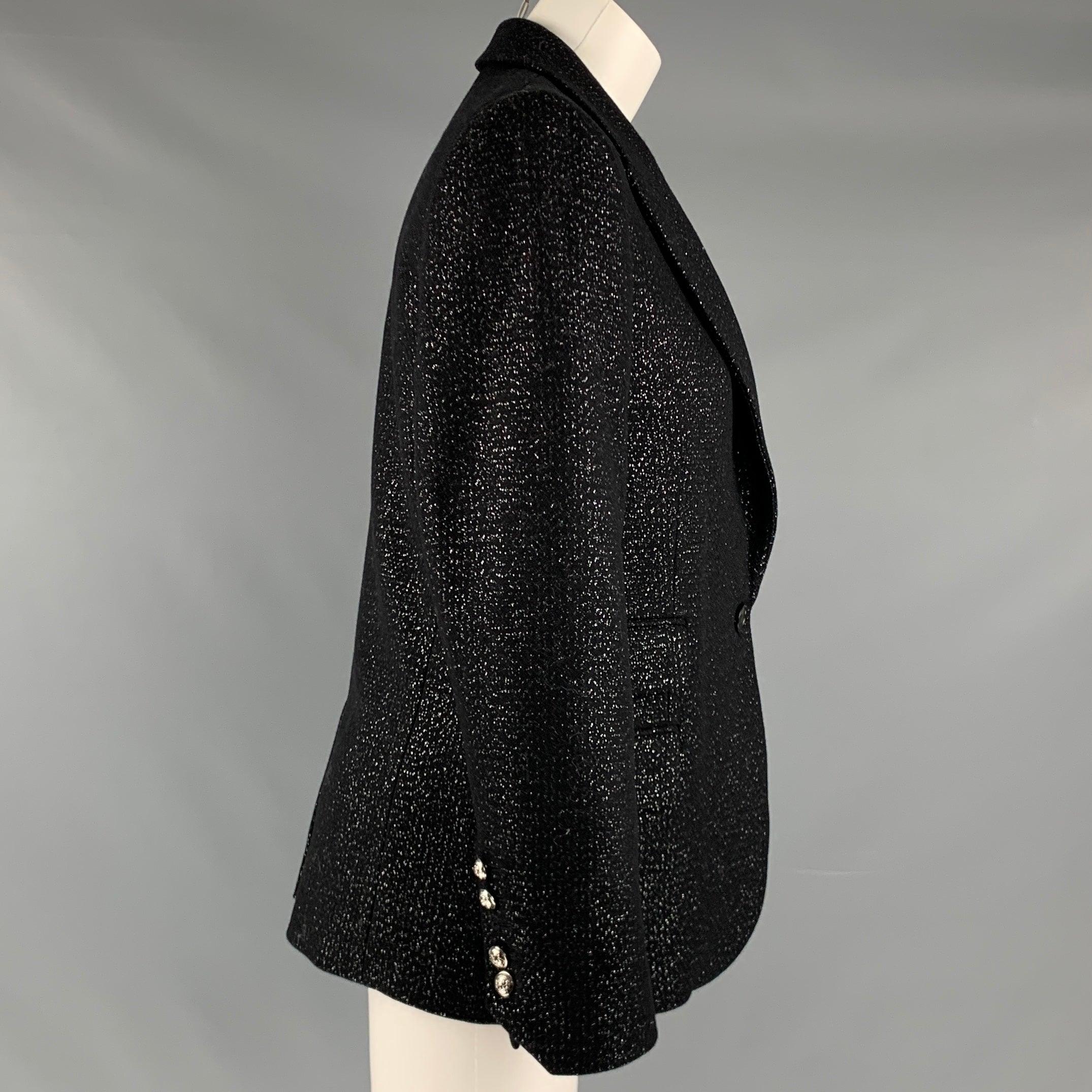 ZADIG & VOLTAIRE jacket comes in a black and novelty silver wool blend material featuring a flap pockets, shoulder pads, peak lapel, single back vent, and a single button closure. Excellent Pre- Owned Conditions. 

Marked:   36 

Measurements: 
