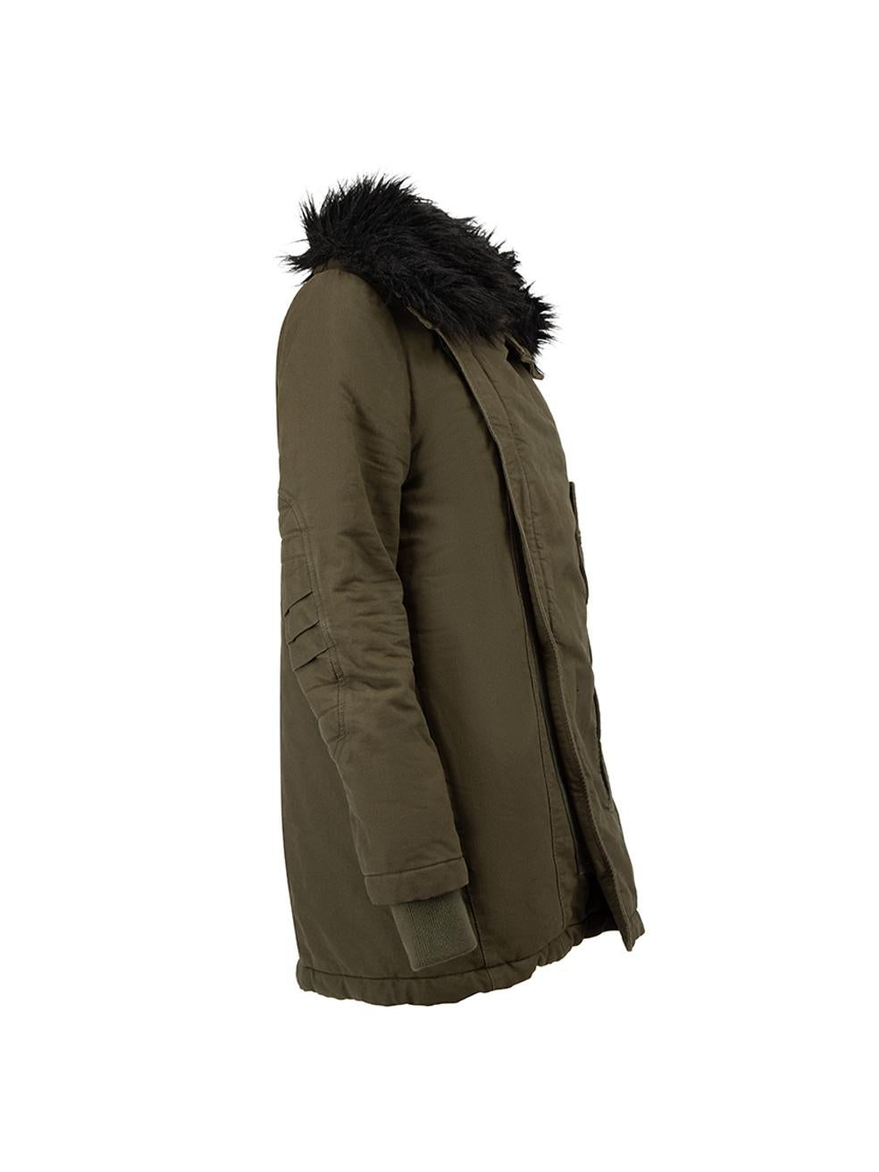 CONDITION is Very good. Minimal wear to jacket is evident. Minimal wear to the faux fur collar which is starting to matt up a little bit. There is also wear to the interior lining where stains can be seen near the bottoms and side of the jacket. The