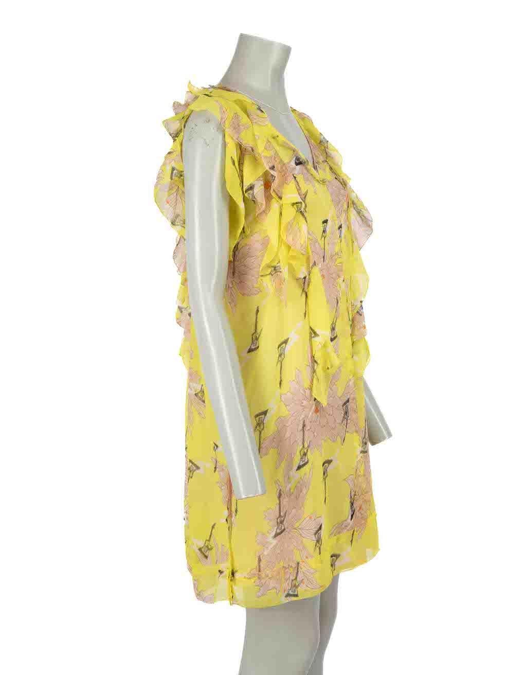 CONDITION is Very good. Hardly any visible wear to dress is evident on this used Zadig & Voltaire designer resale item.
 
 Details
 Yellow
 Polyester
 Mini dress
 Floral pattern
 Ruffles accent
 Sheer
 V neckline
 Back tie strap closure on back
 
 

