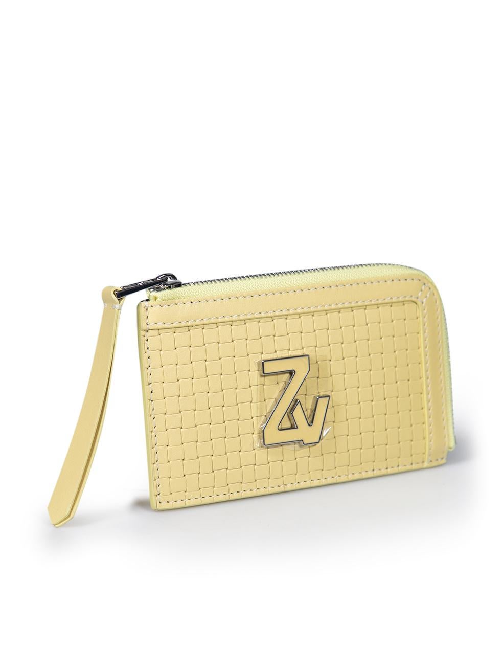 CONDITION is Very good. Hardly any visible wear to purse is evident on this used Zadig & Voltaire designer resale item. This item comes with original dust bag.
 
 
 
 Details
 
 
 Yellow
 
 Leather
 
 Wallet
 
 Woven pattern
 
 Front logo plaque
 
