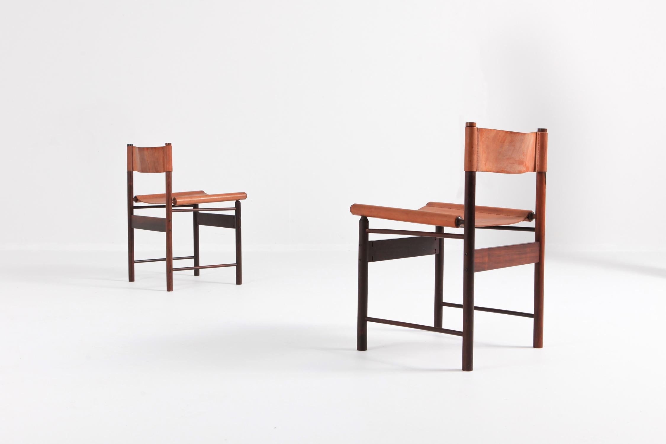 L'atelier Brazil set of six dining chairs by Jorge Zalszupin (°Warsaw, 1922).

Produced by, circa 1955.

Brazilian wood / jacaranda and leather.

These are also featured in the book about Jorge Zalszupin and Modern Design in Brazil.
Very