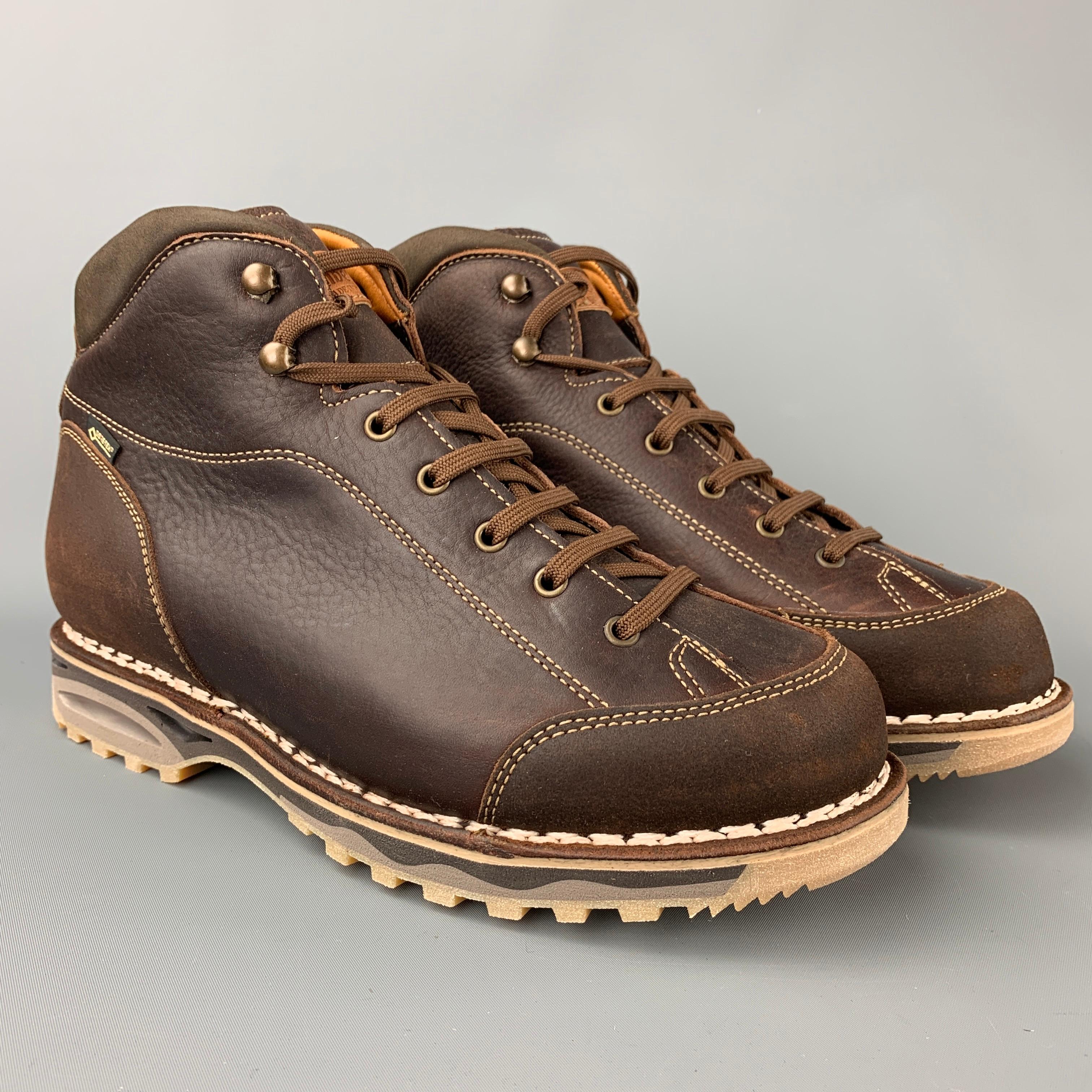 ZAMBERLAN boots comes in a brown leather with contrast stitching featuring a hiking style, gore-tex, vibram sole, and a lace up closure. Comes with dust bag. Made in Italy.

Brand New. 
Marked: US 9 / EU 43
Original Retail Price: