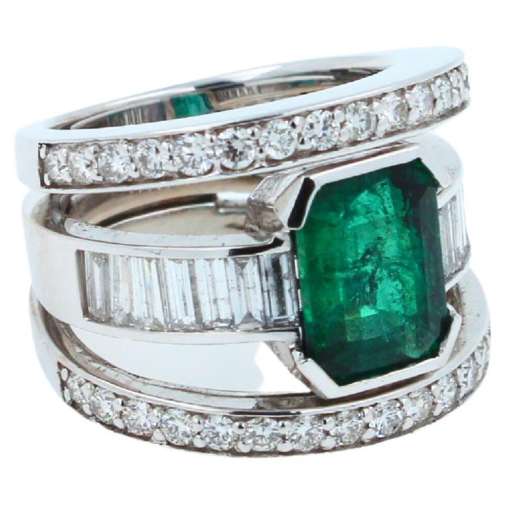 Emerald Cut Zambian Emerald 18 Karat White Gold Full Finger Bezel Diamond Baguette Rows Ring For Sale