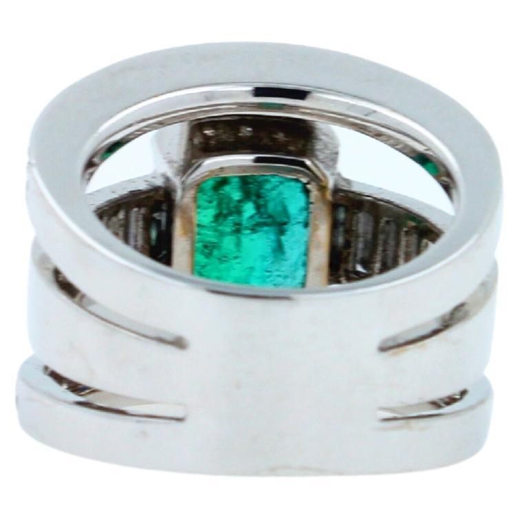 Zambian Emerald 18 Karat White Gold Full Finger Bezel Diamond Baguette Rows Ring In New Condition For Sale In Oakton, VA