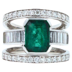 Zambian Emerald 18 Karat White Gold Full Finger Bezel Diamond Baguette Rows Ring