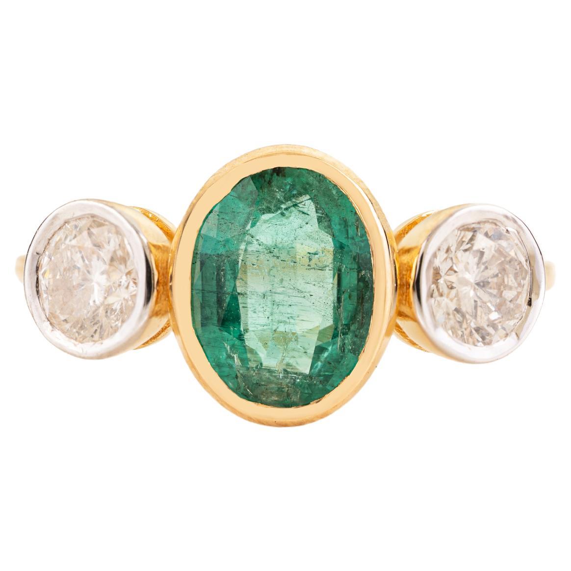 For Sale:  Zambian Emerald and Diamond Bezel Set Three-Stone Ring in 14k Yellow Gold 1 CTW