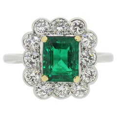 Vintage Zambian Emerald and Diamond Cluster Ring