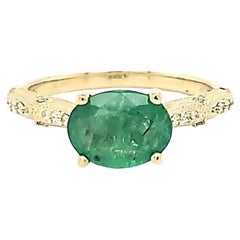 Bague en or jaune 14kt avec émeraude zambienne et diamant