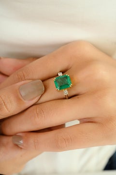 Zambian Emerald and Diamond Three-Stone Ring in 18k Yellow and White Gold