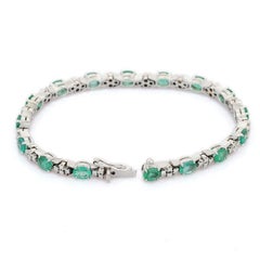 Pulsera de boda de esmeralda y diamantes de Zambia en oro blanco de 18 quilates Joyería hecha a mano