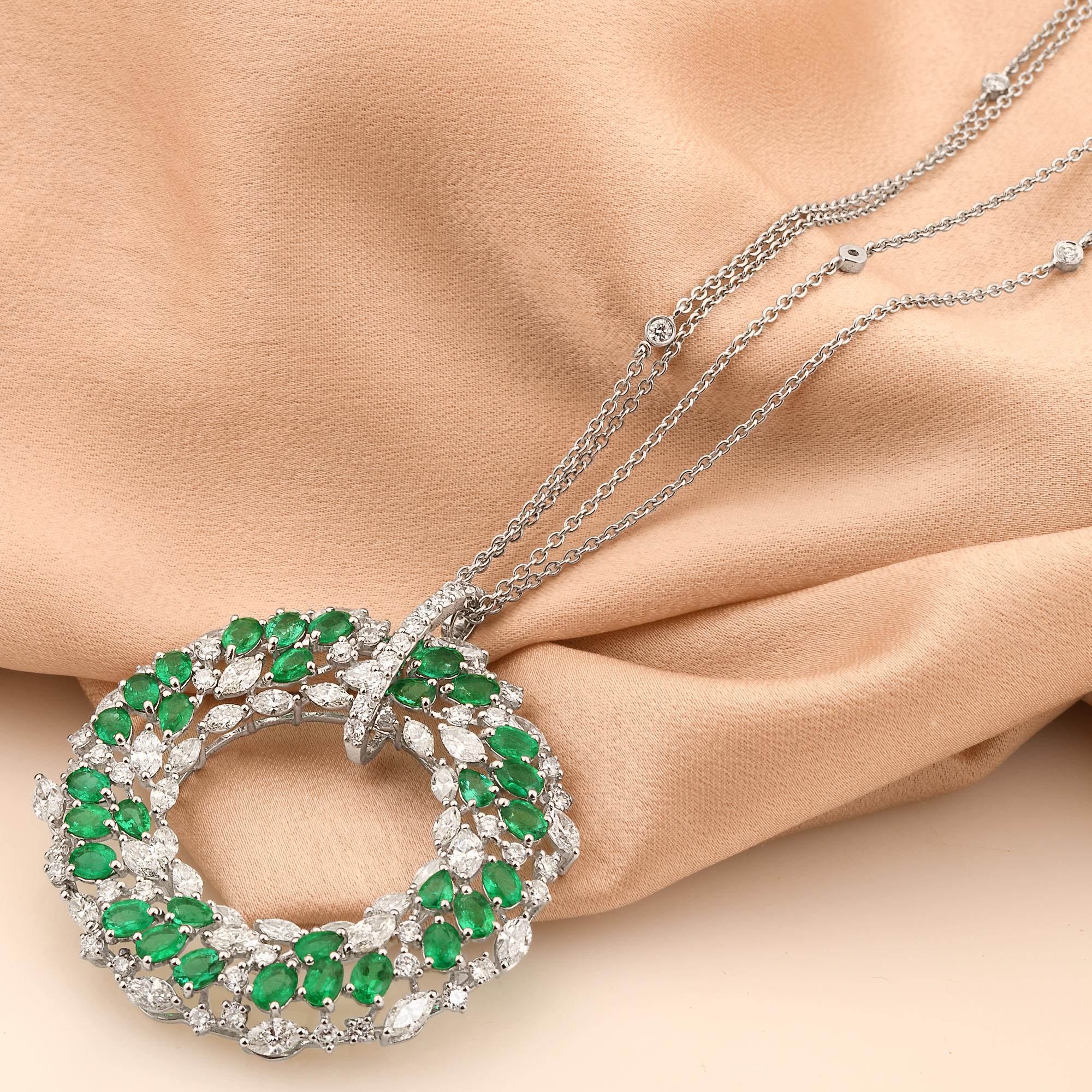 Make a statement of timeless elegance with this Natural Emerald Circle Pendant Diamond Necklace. With its captivating emerald gemstone, sparkling diamonds, and 18-karat white gold craftsmanship, it is a stunning addition to your jewelry