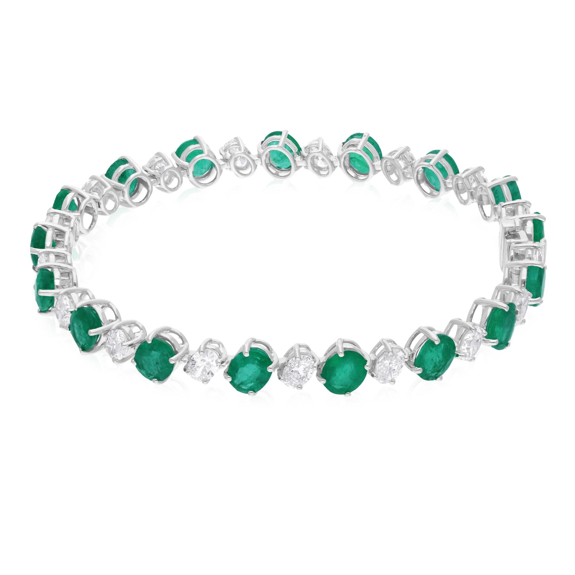 Cast from 14-karat gold, these exquisite bracelet is handset with 10.01 carats Zambian emerald and 3.82 carats of sparkling diamonds.

FOLLOW SPECTRUM JEWELS storefront to view the latest collection & exclusive pieces. Spectrum Jewels is proudly
