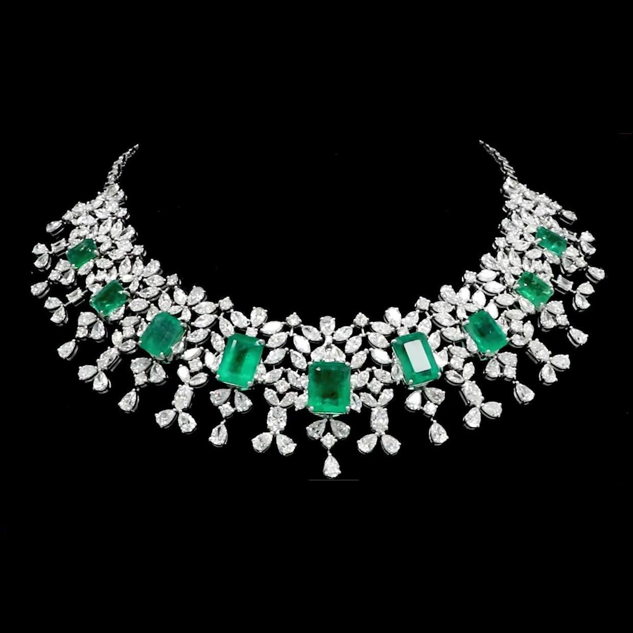 Item Code :- SEN-5246
Gross Wt. :- 98.49 gm
18k White Gold Wt. :- 80.75 gm
Natural Diamond Wt. :- 49.15 Ct. ( AVERAGE DIAMOND CLARITY SI1-SI2 & COLOR H-I )
Emerald Wt. :- 39.54 Ct.
Necklace Size :- 16 Inches Long

✦ Sizing
.....................
We