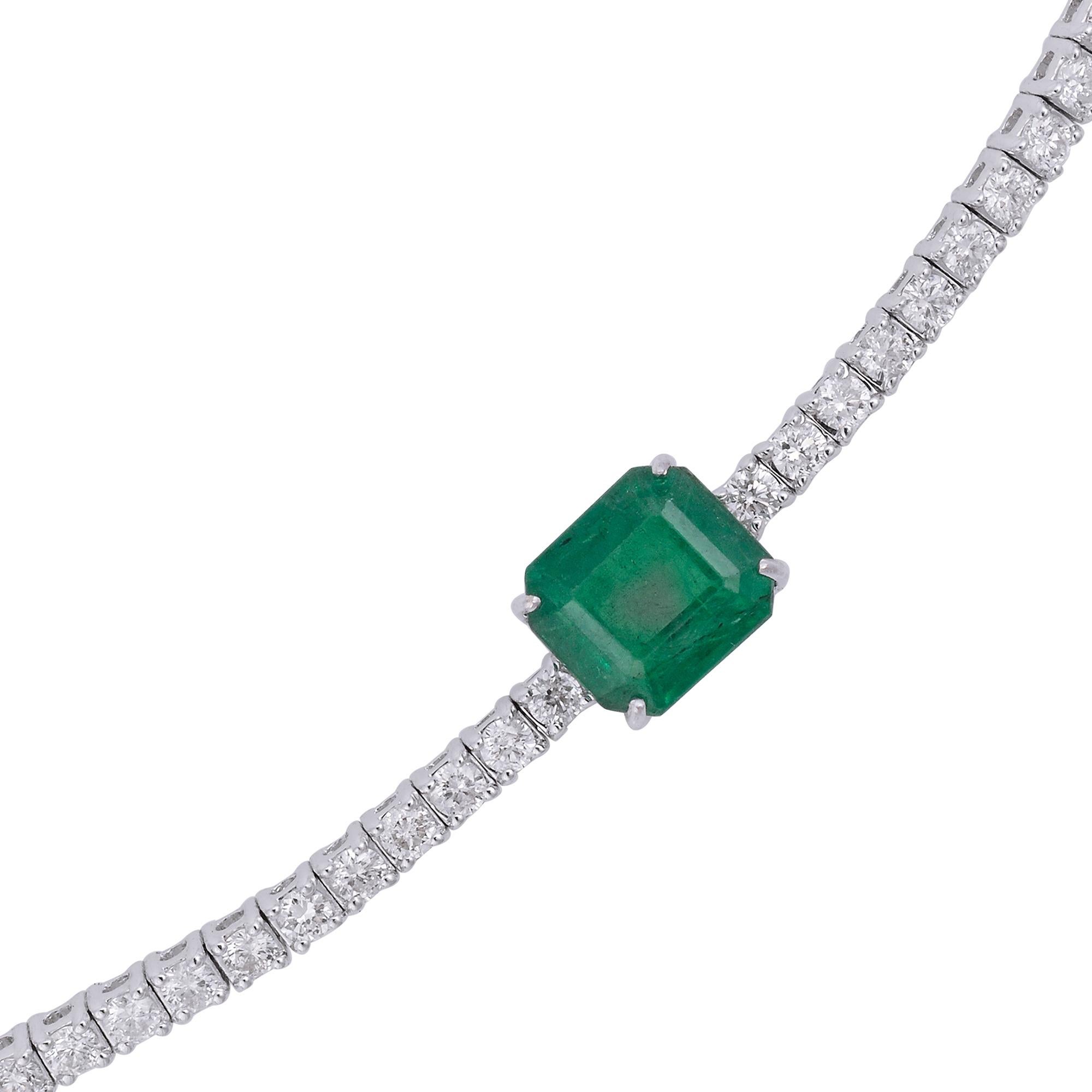 The emerald and diamonds are meticulously set in a solid 18k white gold choker-style necklace, providing a luxurious and enduring setting that perfectly enhances their beauty. The white gold setting not only complements the gemstones and diamonds
