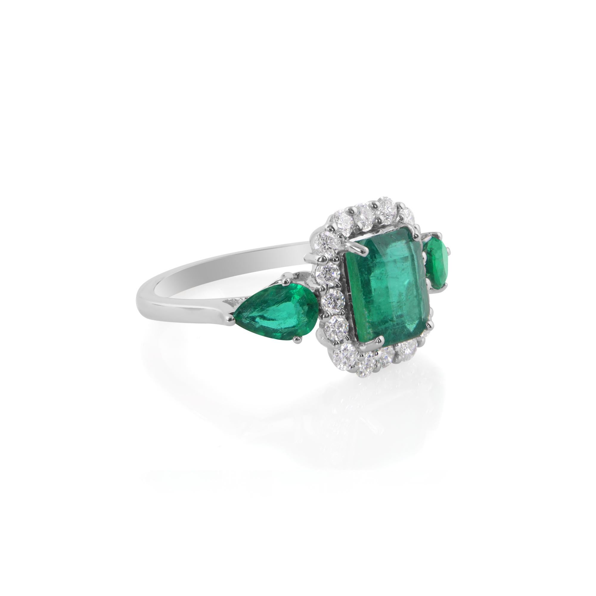 Step into the world of luxury and elegance with our exquisite Zambian Emerald Gemstone Cocktail Ring, a true masterpiece of fine jewelry crafted to captivate hearts and turn heads. Nestled within the embrace of 14 karat white gold, this ring exudes