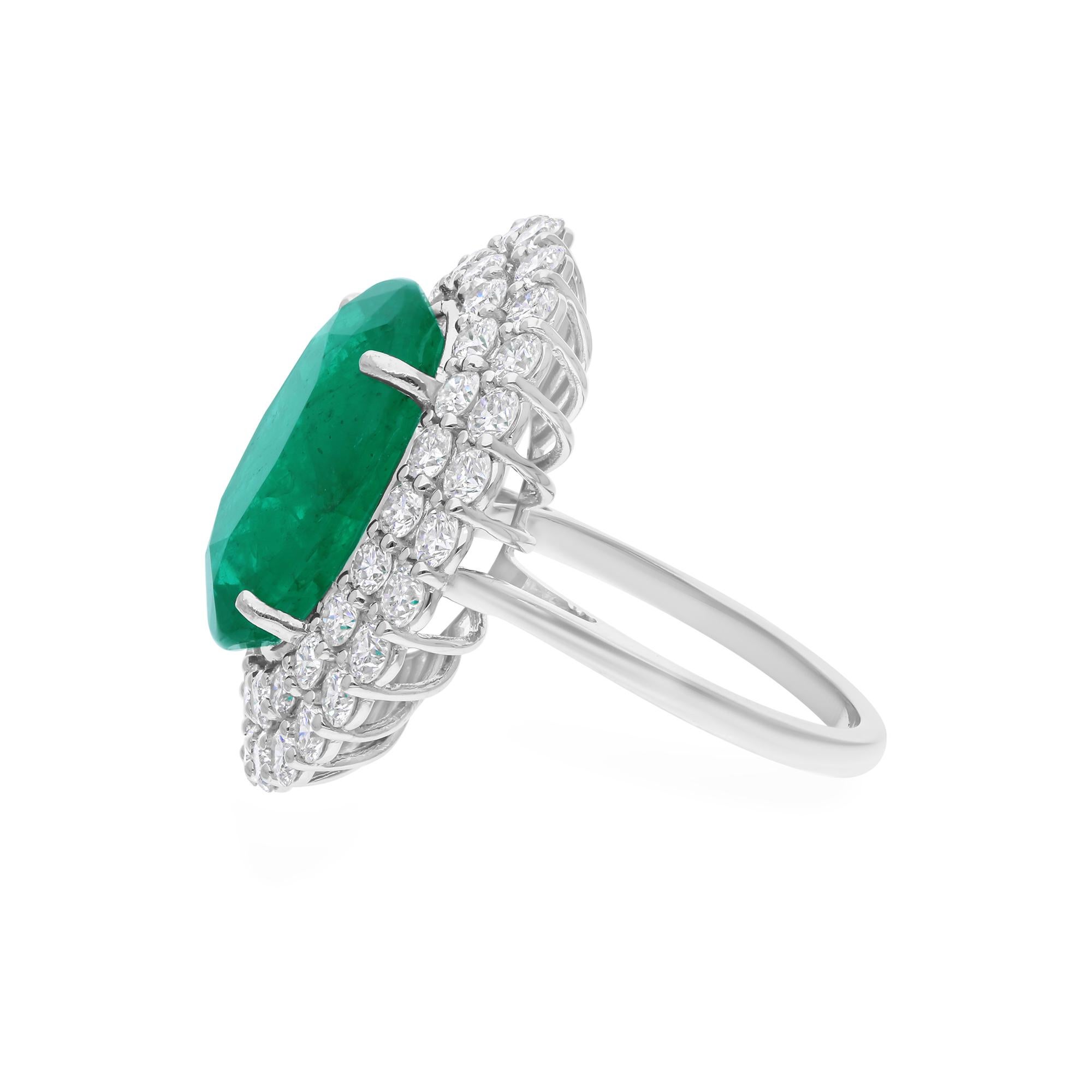 This ring has been meticulously crafted from 18-karat gold and handset with 10.04 carat Zambian emerald and 2.85 carats of sparkling diamonds.

The ring is a size 7 and may be resized to larger or smaller upon request. FOLLOW SPECTRUM JEWELS