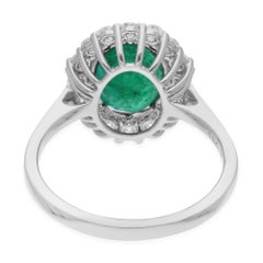 2.80 Carat Emerald and 0.59 Carat Diamond 18K White Gold Halo Ring