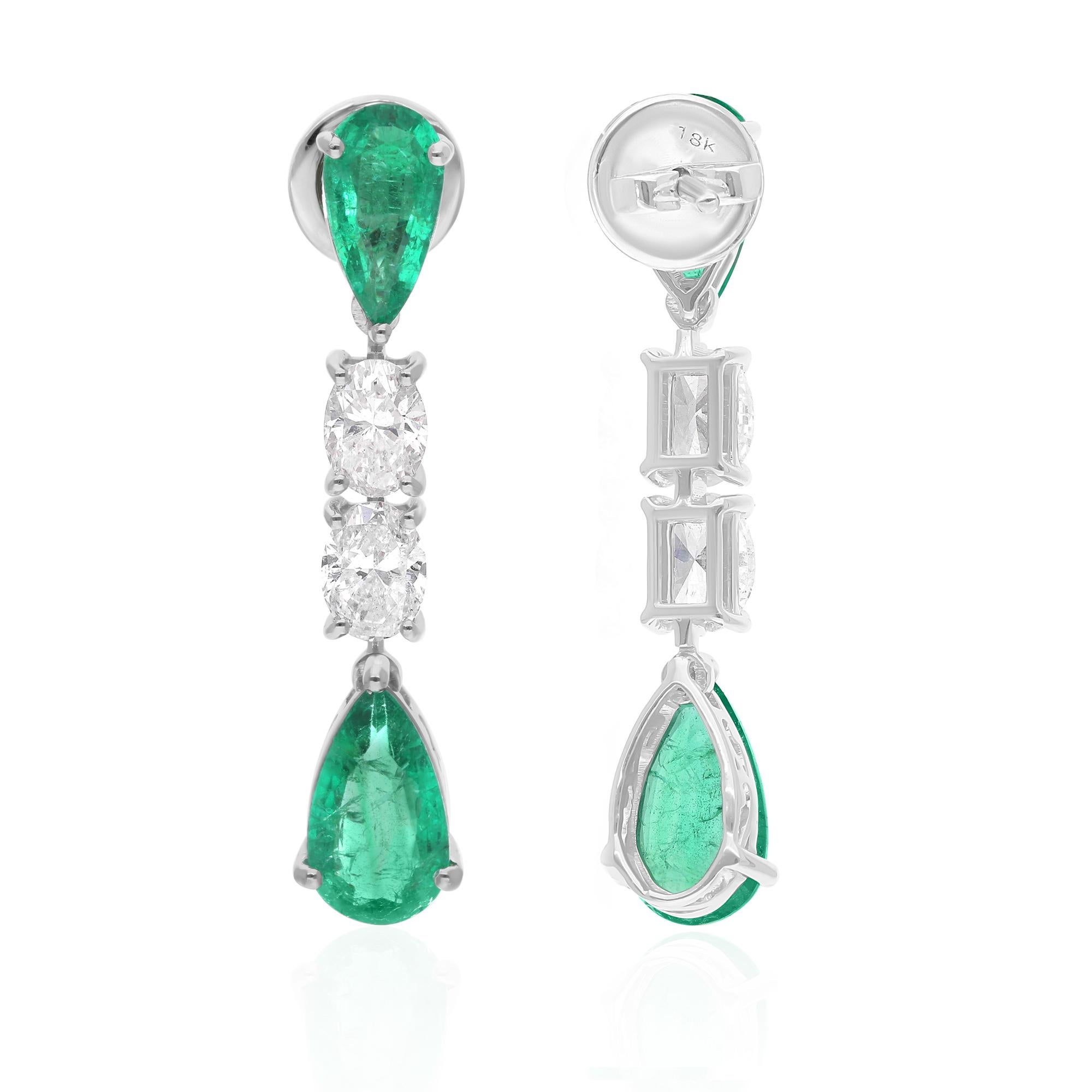 Cast from 18-karat gold, these exquisite earrings are handset with 3.74 carats Zambian emerald and 1.65 carats of sparkling diamonds.

FOLLOW SPECTRUM JEWELS storefront to view the latest collection & exclusive pieces. Spectrum Jewels is proudly