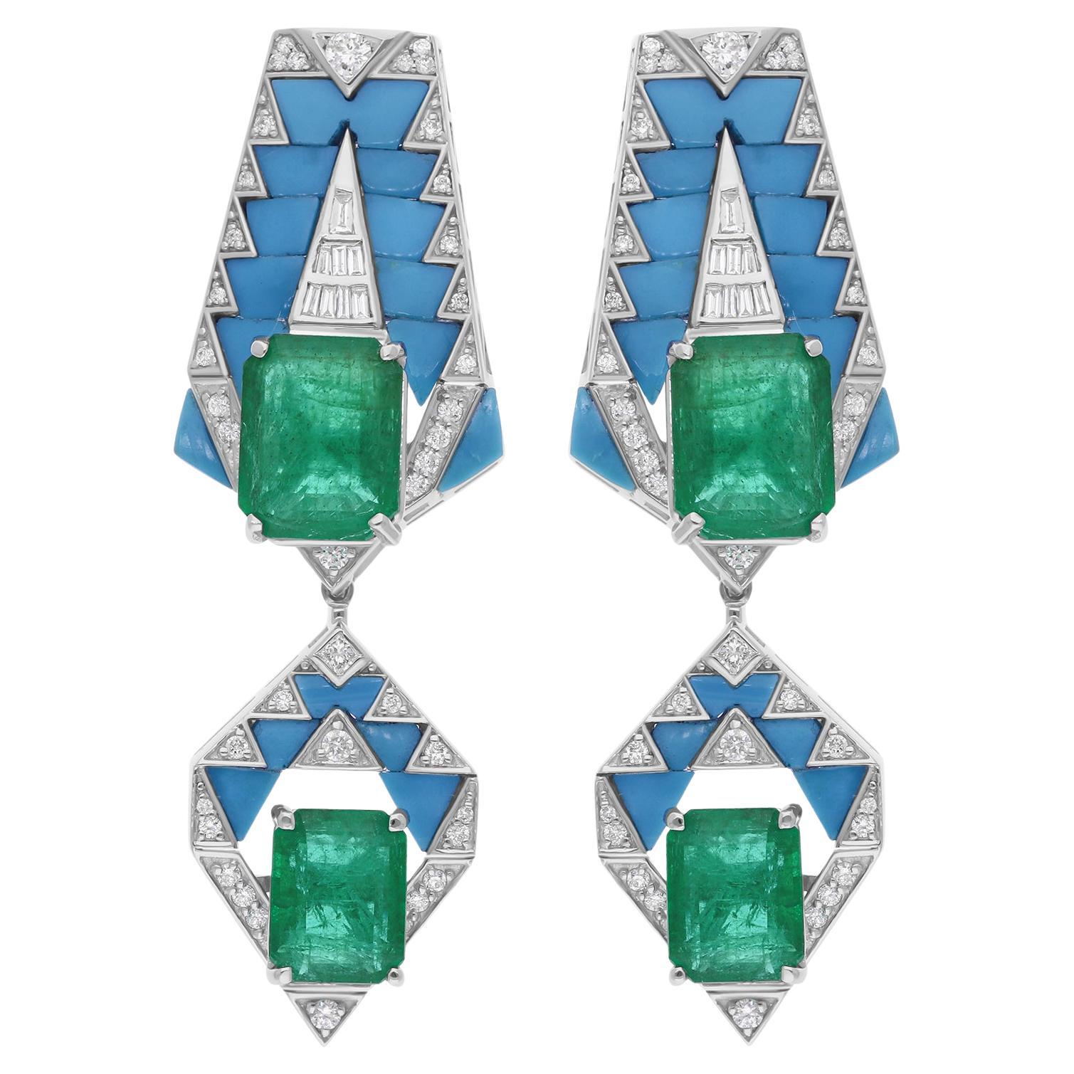 Orecchini pendenti con pietra smeraldo dello Zambia Diamante turchese Oro bianco 18 carati
Questi orecchini sono caratterizzati da una gemma turchese e da uno smeraldo ottagonale che formano degli orecchini pendenti in stile art déco. 
Conosciuto
