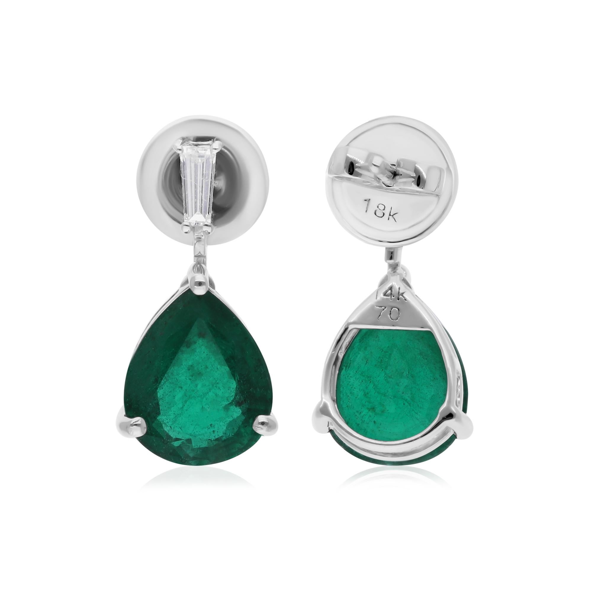 Cast from 14-karat gold, these exquisite earrings are handset with 4.48 carats Zambian emerald and 0.20 carats of sparkling diamonds.

FOLLOW SPECTRUM JEWELS storefront to view the latest collection & exclusive pieces. Spectrum Jewels is proudly