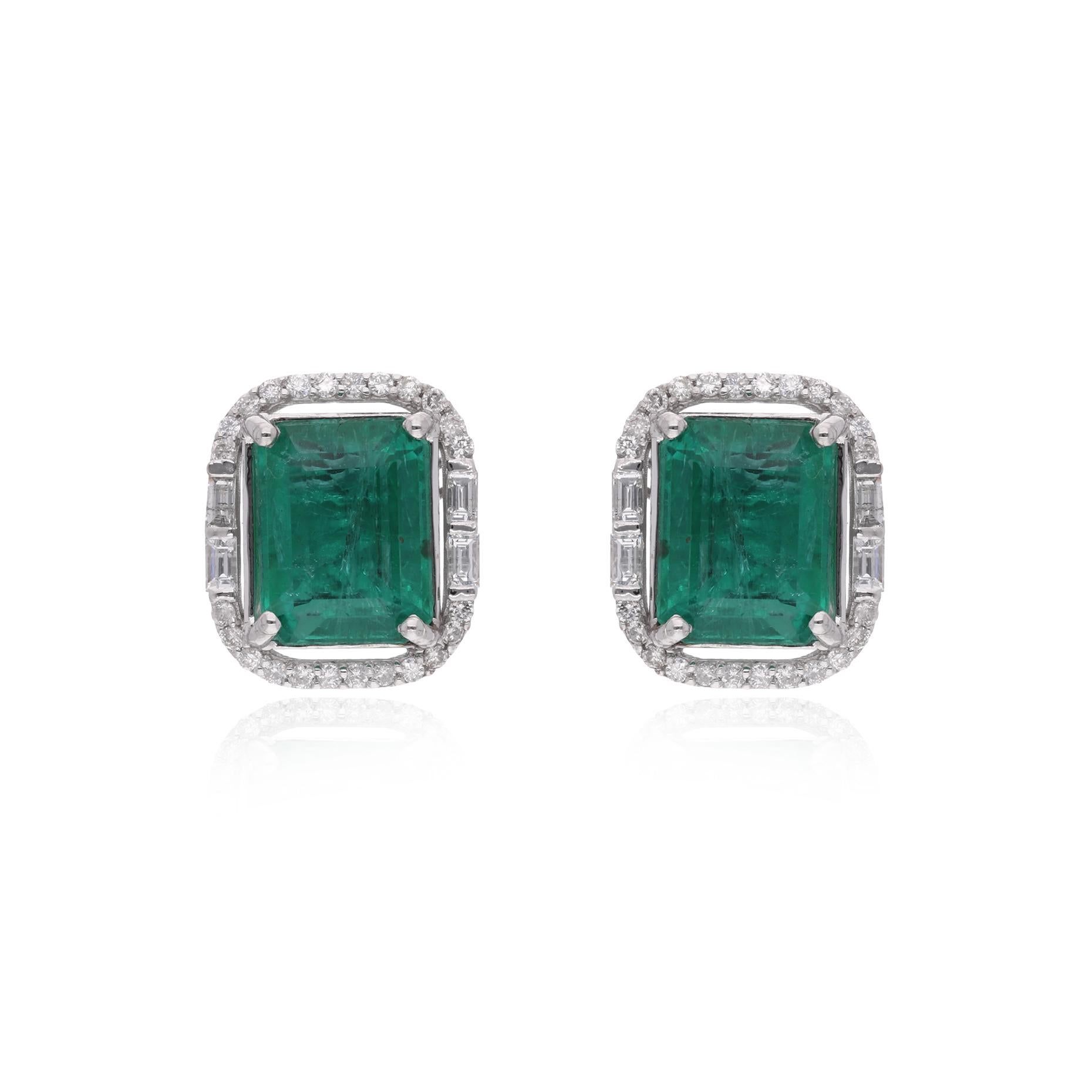 Add a touch of timeless elegance to your jewelry collection with these exquisite Diamond Emerald Stud Earrings. These earrings are perfectly accented by a beautiful emerald at the center, surrounded by a sparkling halo of diamonds. These earrings