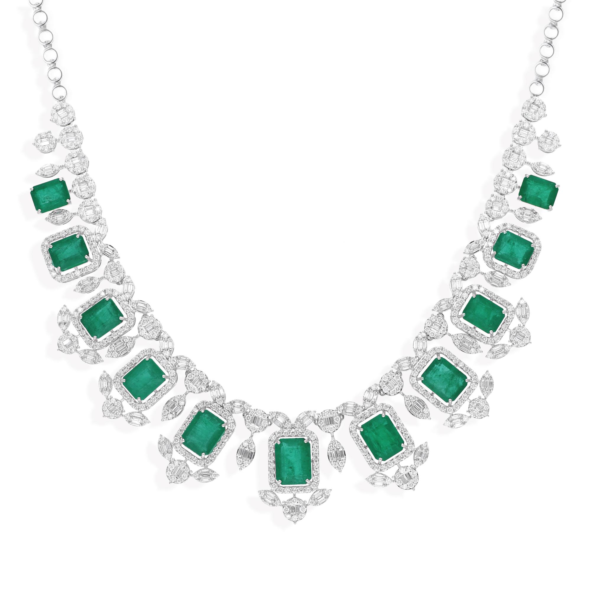 Cast from 18-karat gold, these exquisite necklace is handset with 31.74 carats Zambian emerald and 9.90 carats of sparkling diamonds.

FOLLOW SPECTRUM JEWELS storefront to view the latest collection & exclusive pieces. Spectrum Jewels is proudly