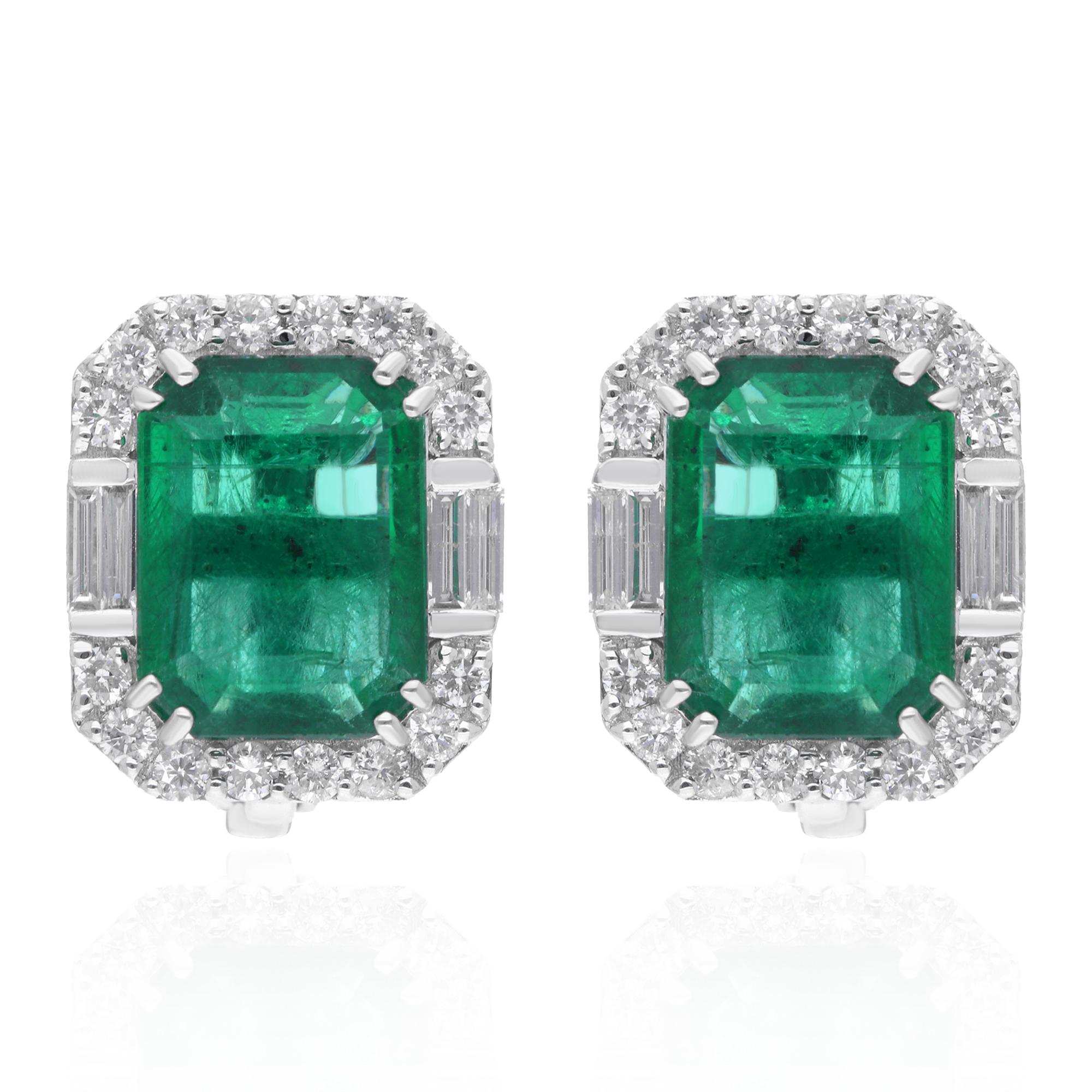 Cast from 14-karat gold, these exquisite earrings are handset with 6.05 carats Zambian emerald and 0.82 carats of sparkling diamonds.

.FOLLOW SPECTRUM JEWELS storefront to view the latest collection & exclusive pieces. Spectrum Jewels is proudly