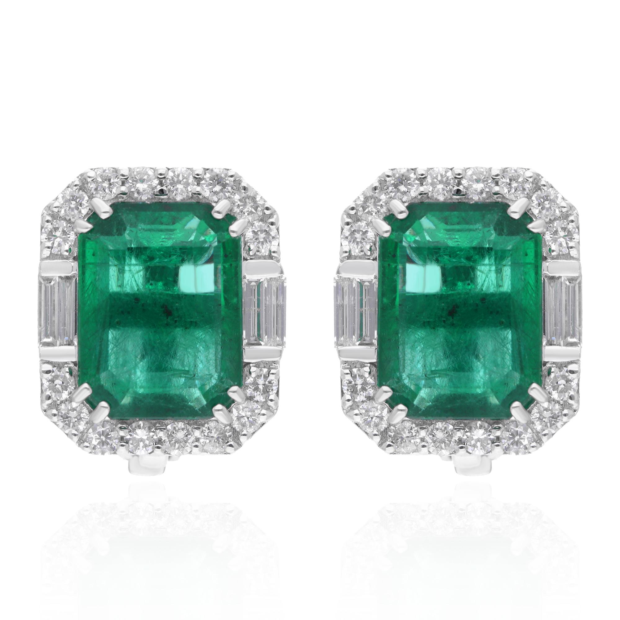 Indulge in the captivating allure of these Zambian Emerald Gemstone Stud Earrings, exquisitely crafted in 18 karat white gold. Each earring features a mesmerizing Zambian emerald, renowned for its rich green hue and exceptional clarity, creating a