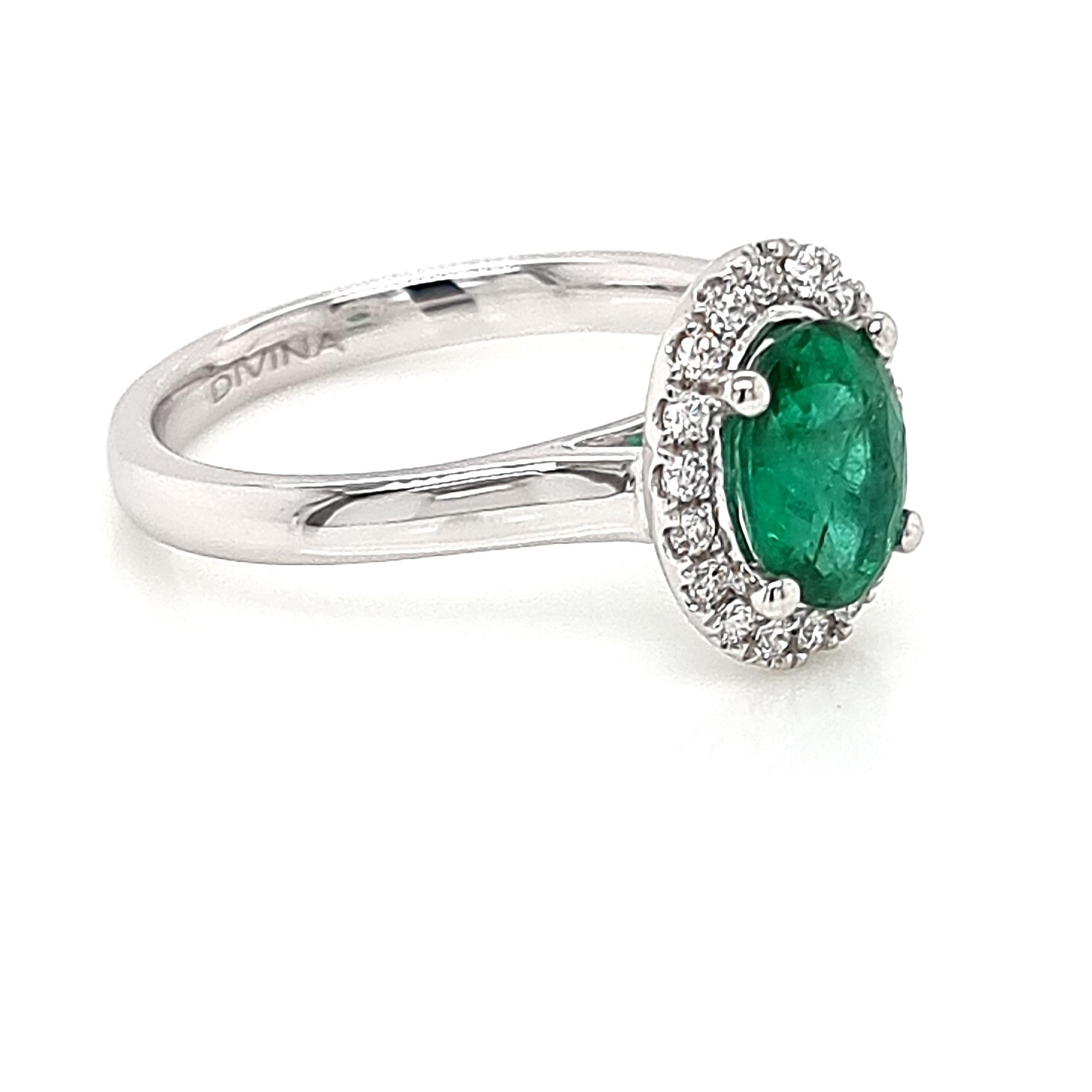 Have you seen our timeless classic style halo ring? A true symbol of refined elegance and sophistication. Meticulously crafted in 9K white gold, this exquisite piece exudes a luxurious allure. At its heart lies a Zambian oval emerald, radiating a