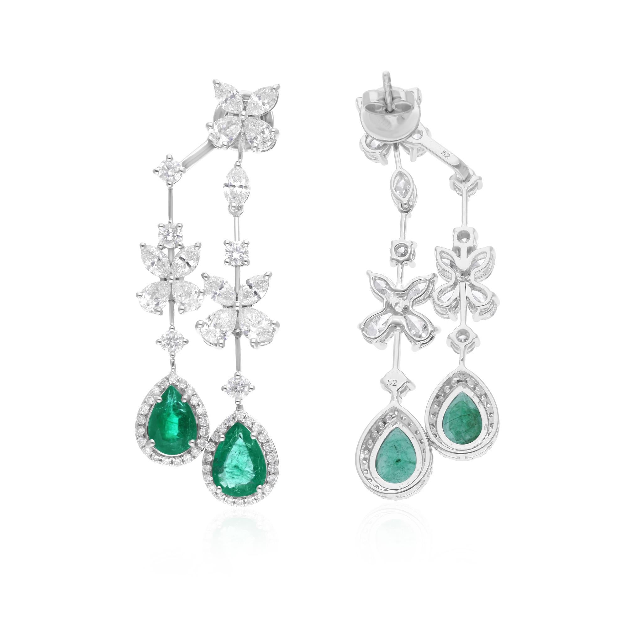 Cast from 14-karat gold, these exquisite earrings are handset with 4.25 carats Zambian emerald gemstone and 5.68 carats of sparkling diamonds.

FOLLOW SPECTRUM JEWELS storefront to view the latest collection & exclusive pieces. Spectrum Jewels is