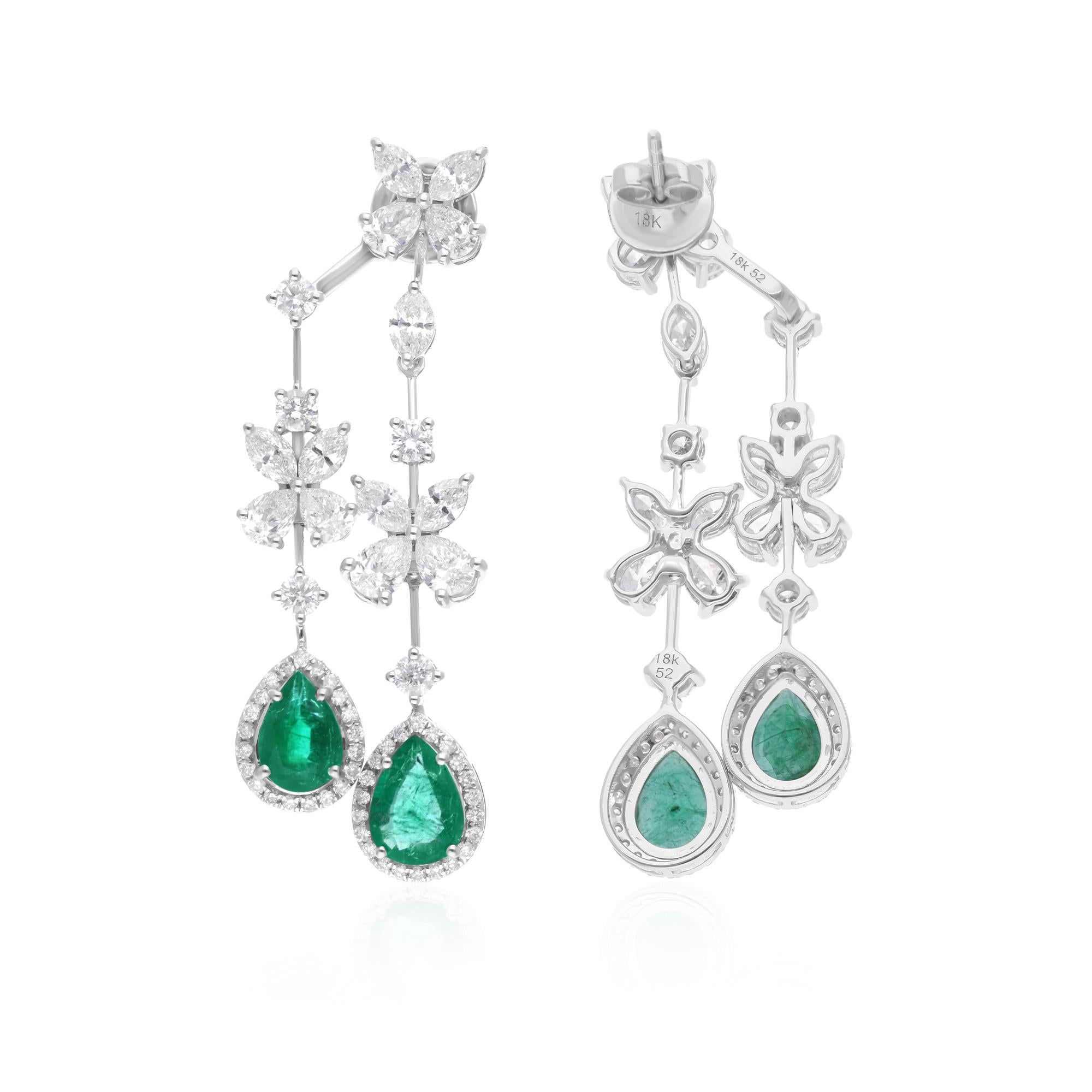 Cast from 18-karat gold, these exquisite earrings are handset with 4.25 carats Zambian emerald gemstone and 5.68 carats of sparkling diamonds.

FOLLOW SPECTRUM JEWELS storefront to view the latest collection & exclusive pieces. Spectrum Jewels is