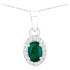 Collana con smeraldo dello Zambia e diamanti 0,81 carati in oro bianco 14K