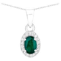 Collier pendentif émeraude de Zambie avec diamants 0,81 carat en or blanc 14 carats