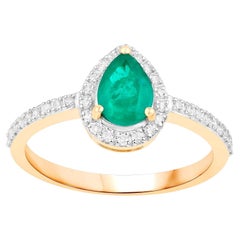 Bague émeraude de Zambie avec diamants 0,88 carat en or jaune 14 carats