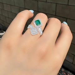 Zambian Emerald Spiral Ring With Channel Setting Diamonds Made In 18k White Gold