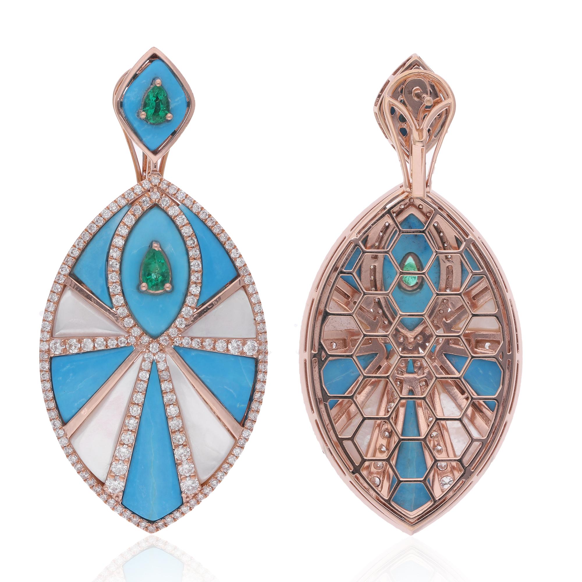 Experience the enchanting allure of these Zambian Emerald Turquoise Diamond Dangle Fine Earrings, meticulously crafted in luxurious 14 karat rose gold and adorned with shimmering diamonds and captivating turquoise gemstones. These exquisite earrings