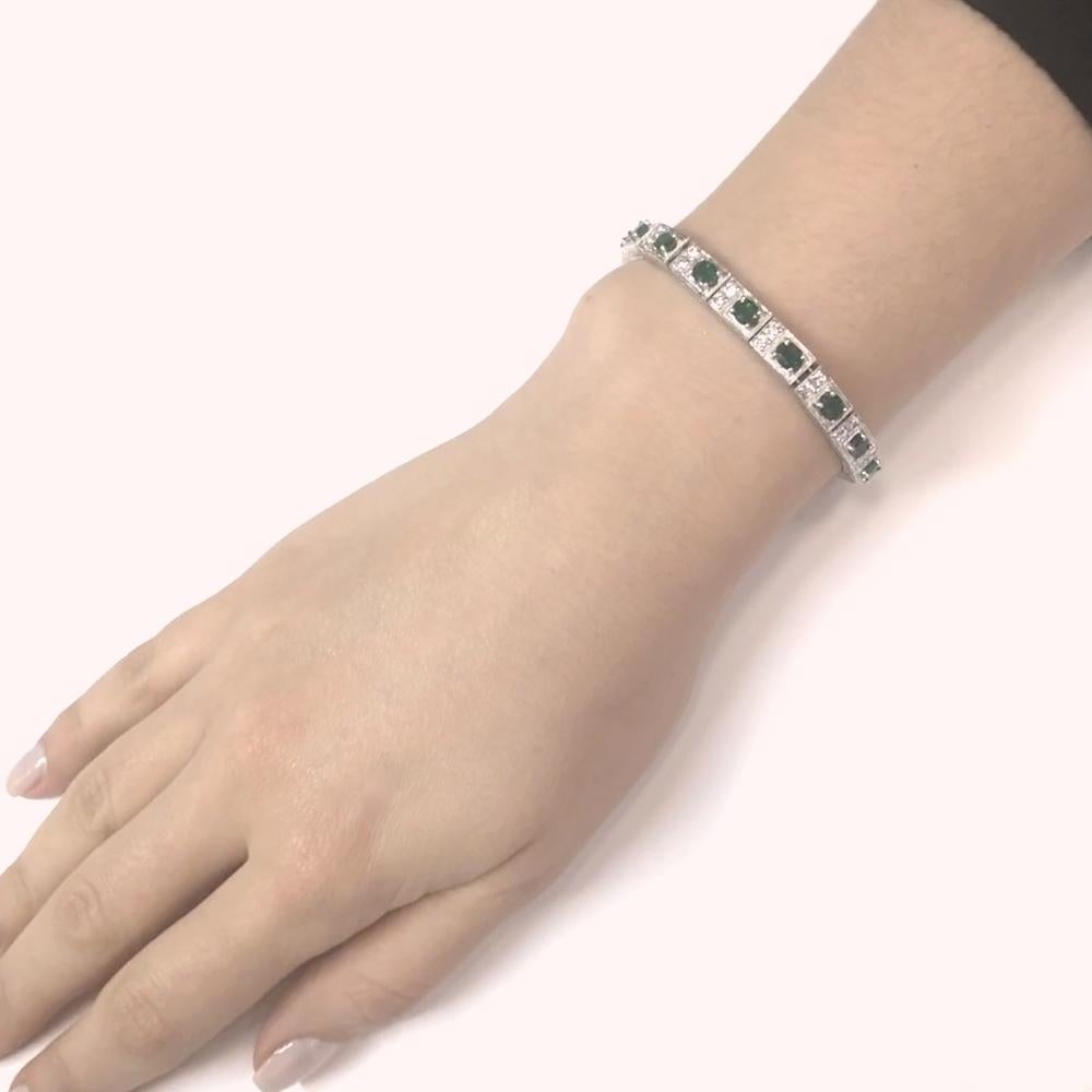 This is a vintage retro inspired emerald and diamond platinum bracelet.  It is adorned with Zambian oval cut emeralds in 6.38 carat total, and accented by round cut white natural diamonds 1.36 ct total.  Diamonds are all natural in G-H Color Clarity