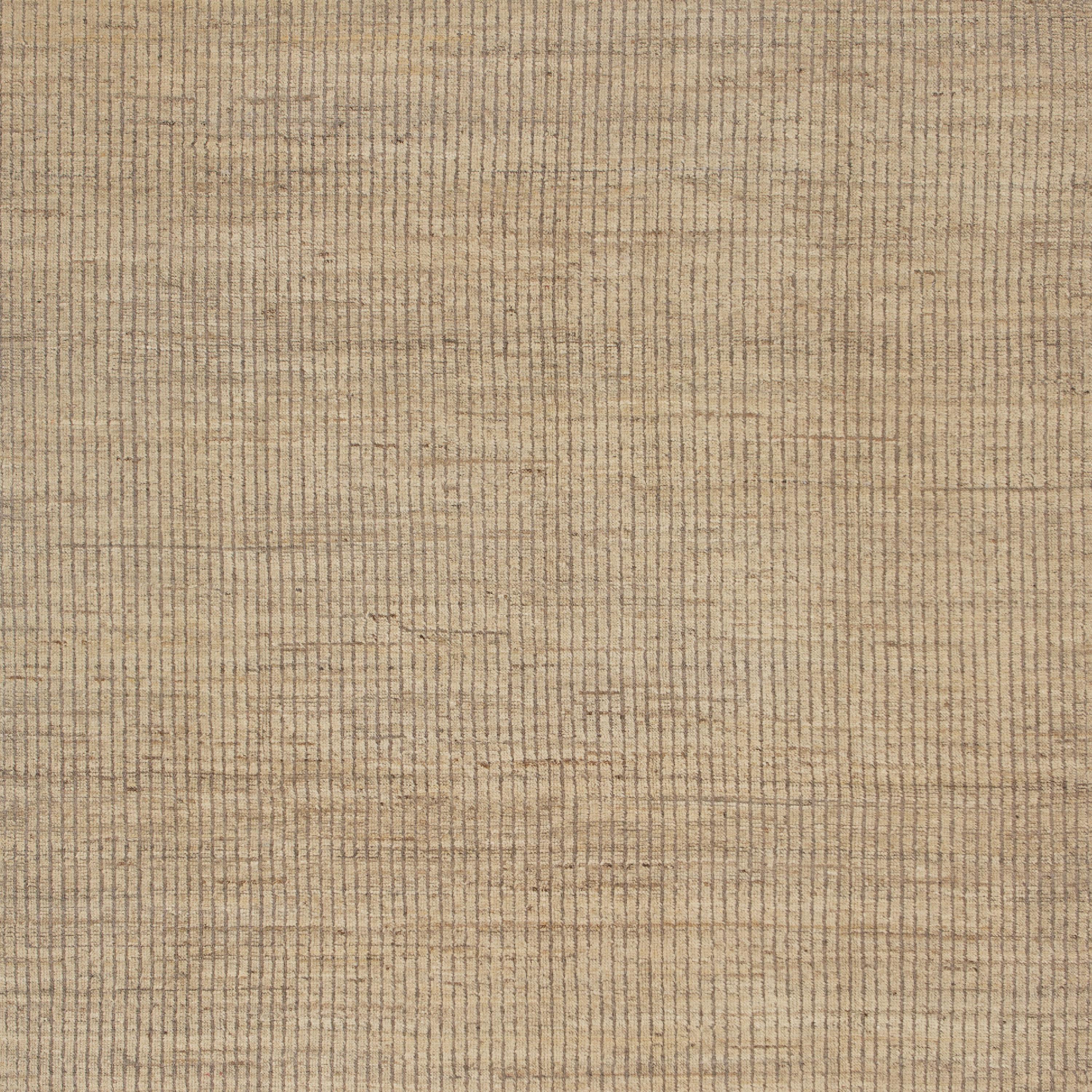 Inspired by the grounding foundations of Earth's natural colors and pure materials, this Zameen Beige Solid Modern Wool Rug - 7'8